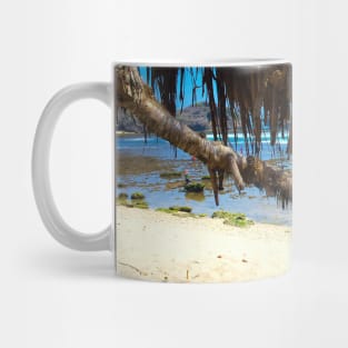 Tree trunks at Watu Karung sand beach Mug